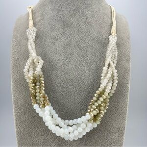 Multi-Strand Beaded Necklace white ivory and earthy-toned faceted glass beads.
